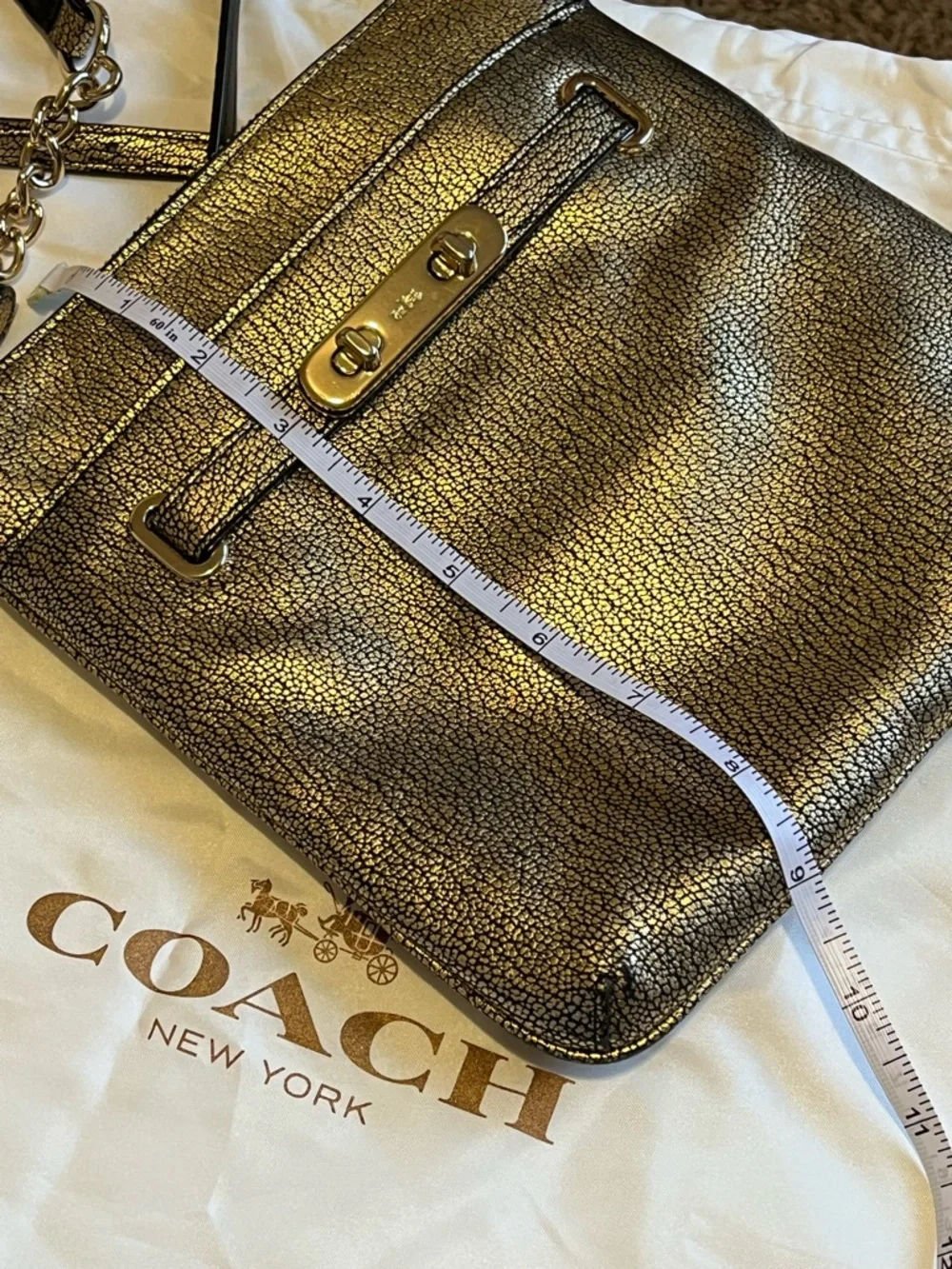 Coach Swagger Swingpack Metallic Gold Crossbody Bag with Turnlock Detail and bag